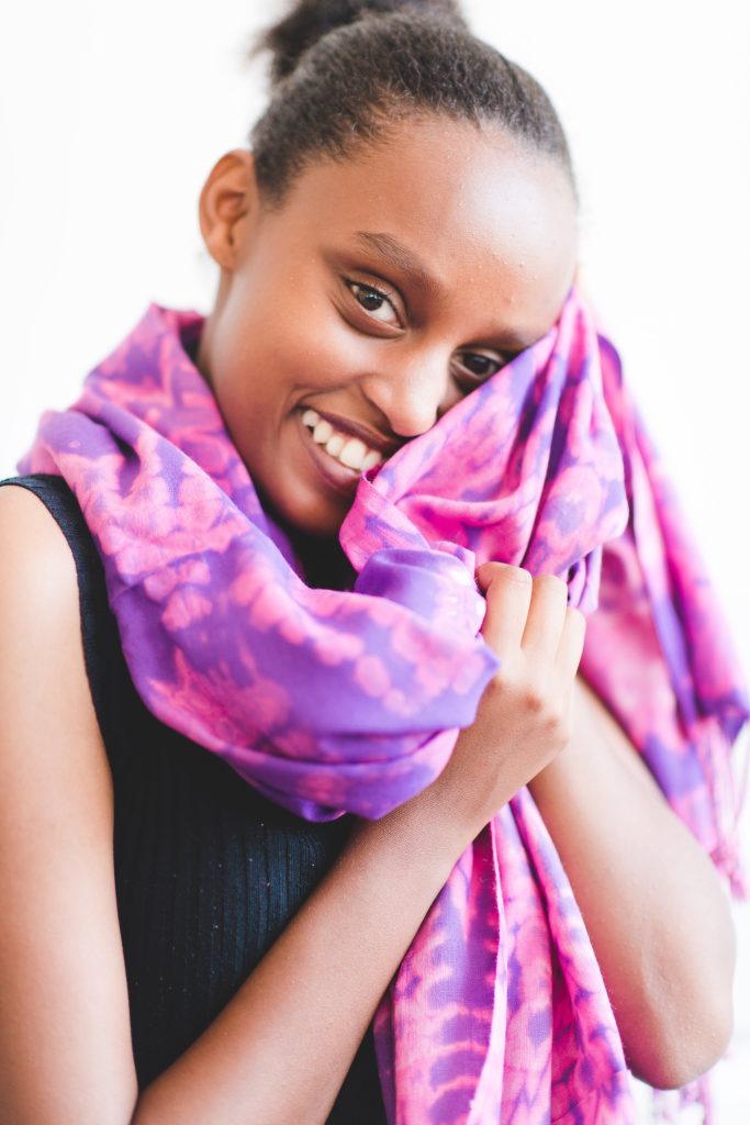 Handcrafted and hand-dyed by refugee artisans in Kenya, these wrap scarves are made from an incredibly soft cotton/rayon blend.