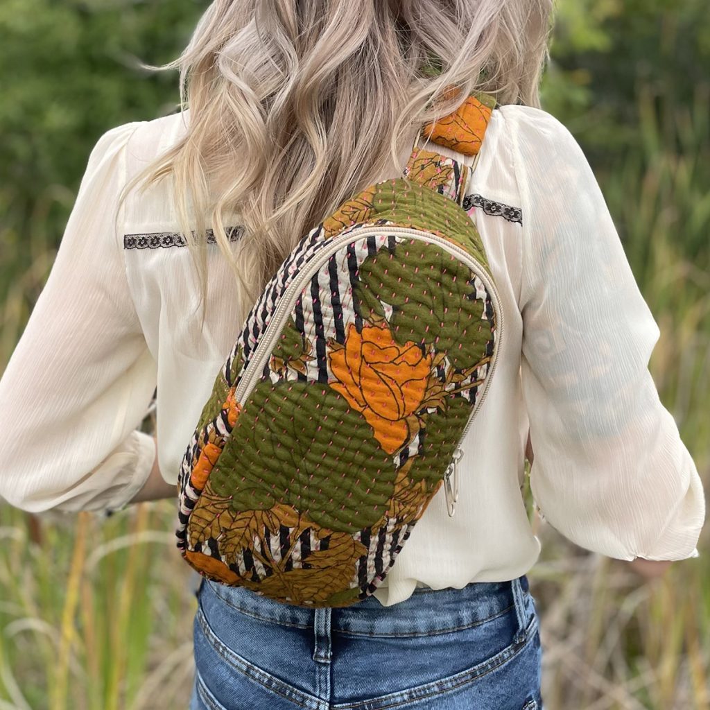 A best-seller, the Kantha Sling Bag keeps all of your necessities within easy reach! Each bag is handmade from repurposed Kantha quilts by women artisans in Bangladesh.