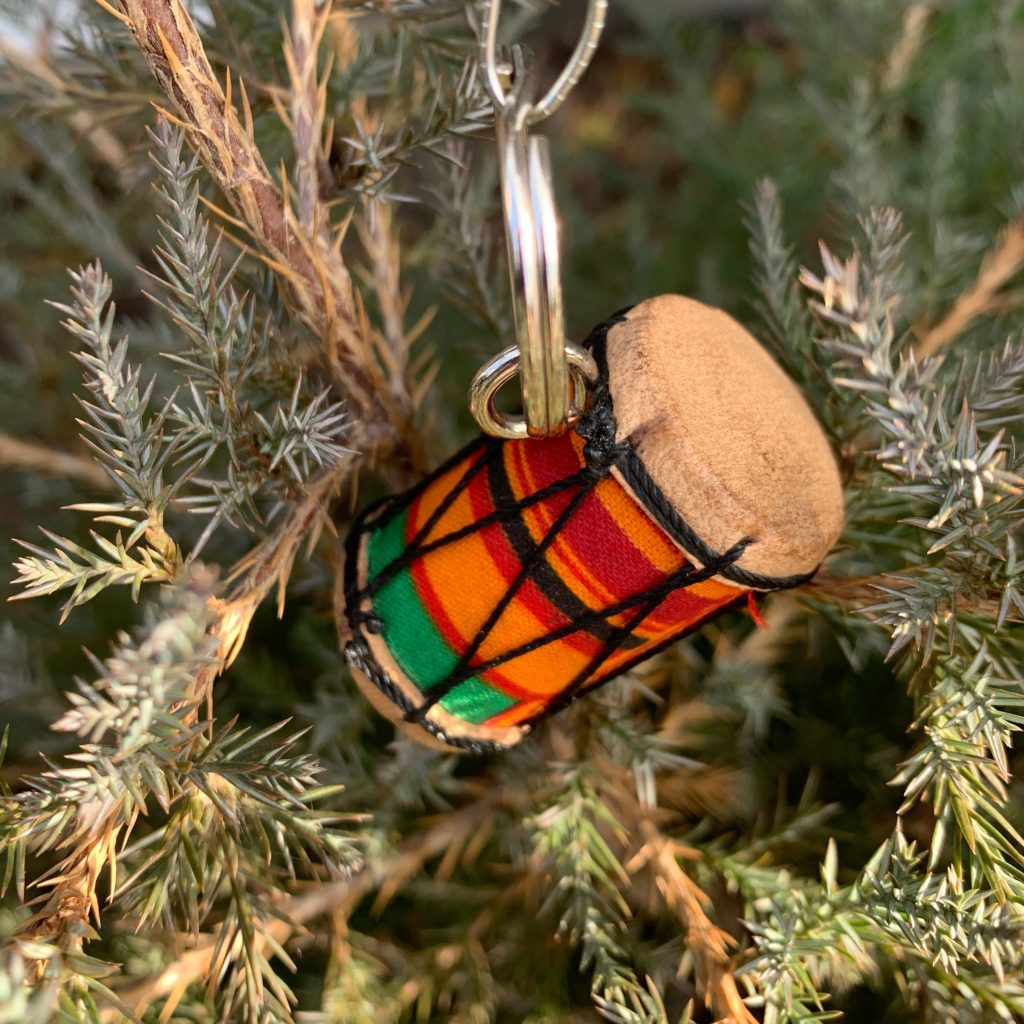 Crafted in Togo, West Africa, these "talking drum" key chains make great stocking stuffers. And, the double as colorful tree ornaments.