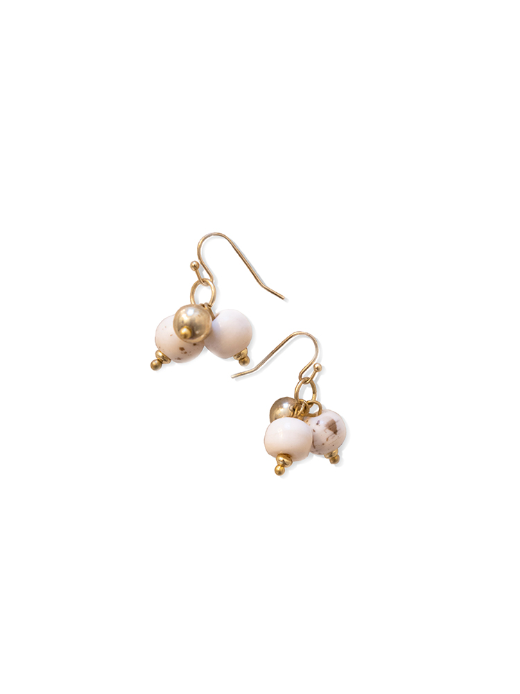 The Alina earrings are a delicate trio of brass and bone beads – perfect to add subtle style to any outfit.